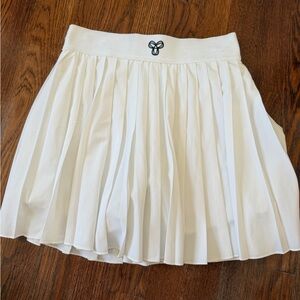 White Pleated Skirt with Embroidered Logo